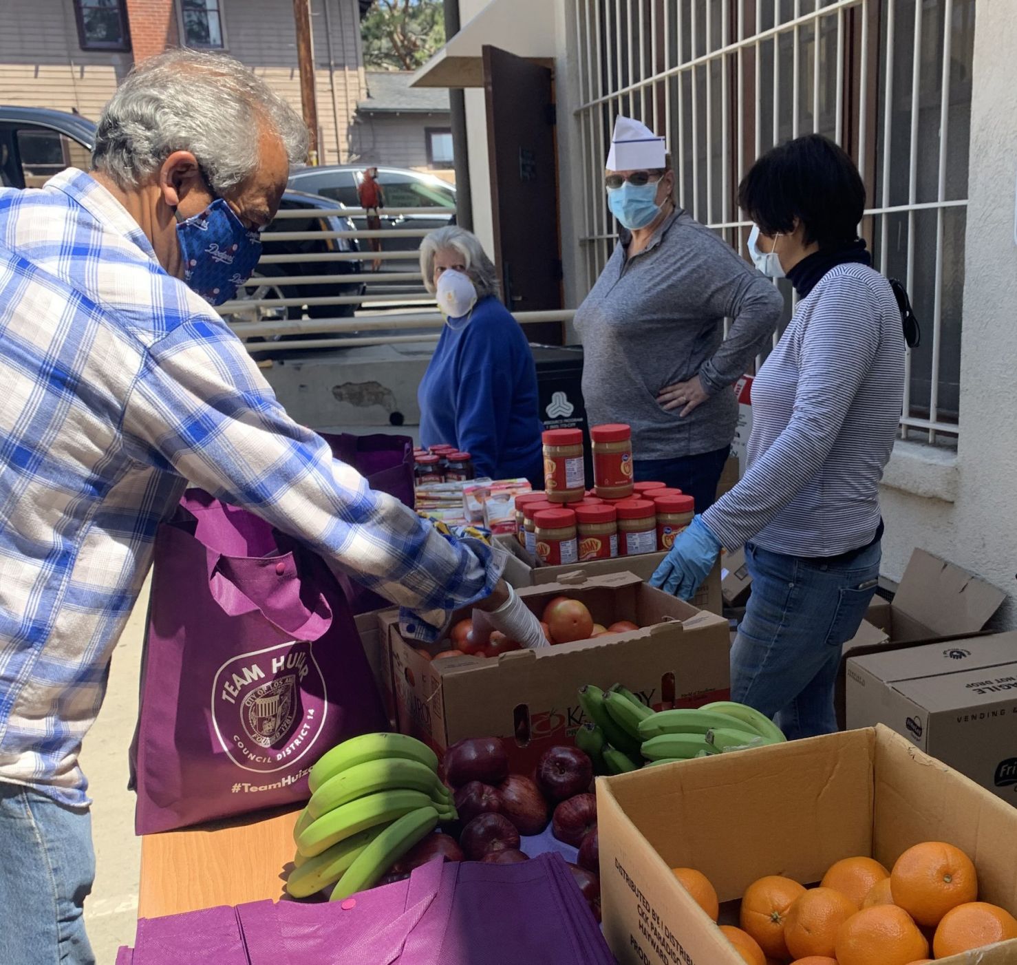 Preparing produce for Eagle Rock food giveaway